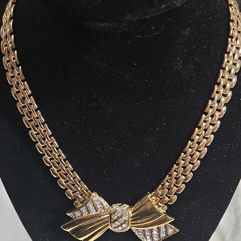 Nina Ricci Gold Bow Necklace with Silver Accents